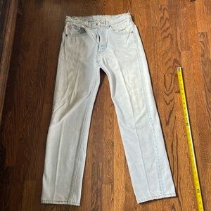 Vintage distressed light wash Levi’s 505 jeans, size 31